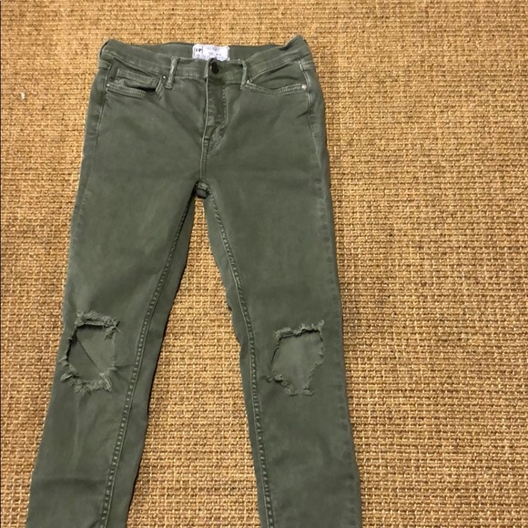 faded green jeans